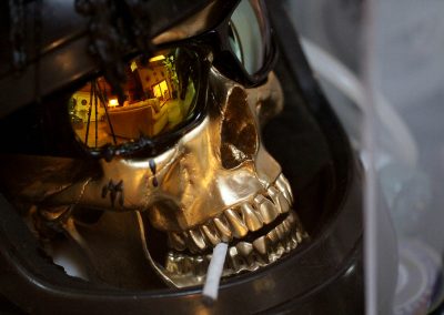 One of several photos of my world-famous sculpture, Skully, a.k.a. Death laughs at us all, created in 2023.