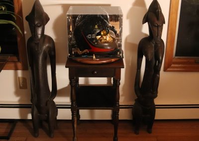 One of several photos of my world-famous sculpture, Skully, a.k.a. Death laughs at us all, created in 2023.